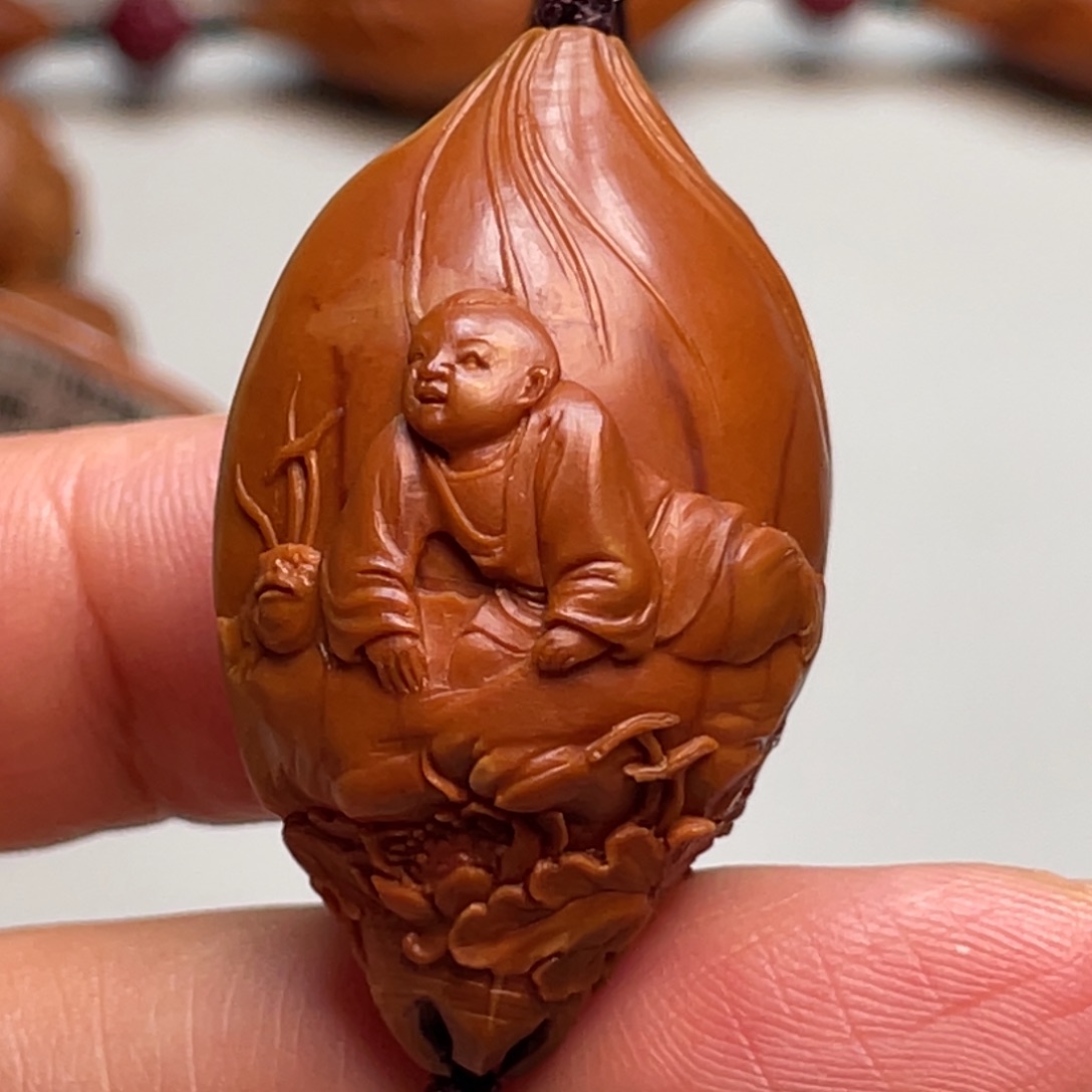 吊坠橄榄核童趣单子