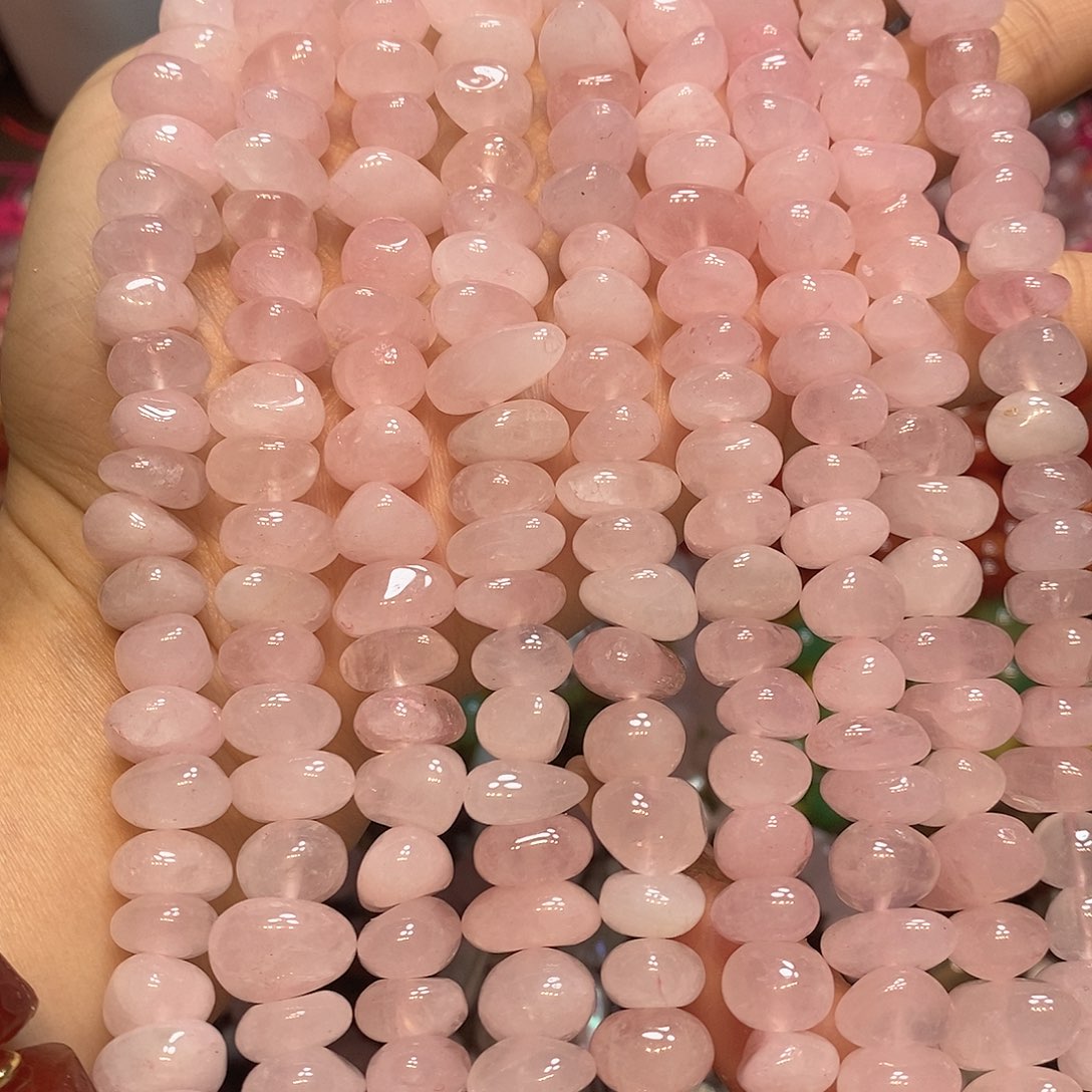 玛瑙/玉髓未镶嵌珠宝半成品天然粉晶中孔随型一条12mm