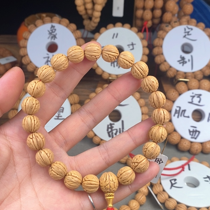 桃核手串金豆11.5宽尺寸误差0.5之间