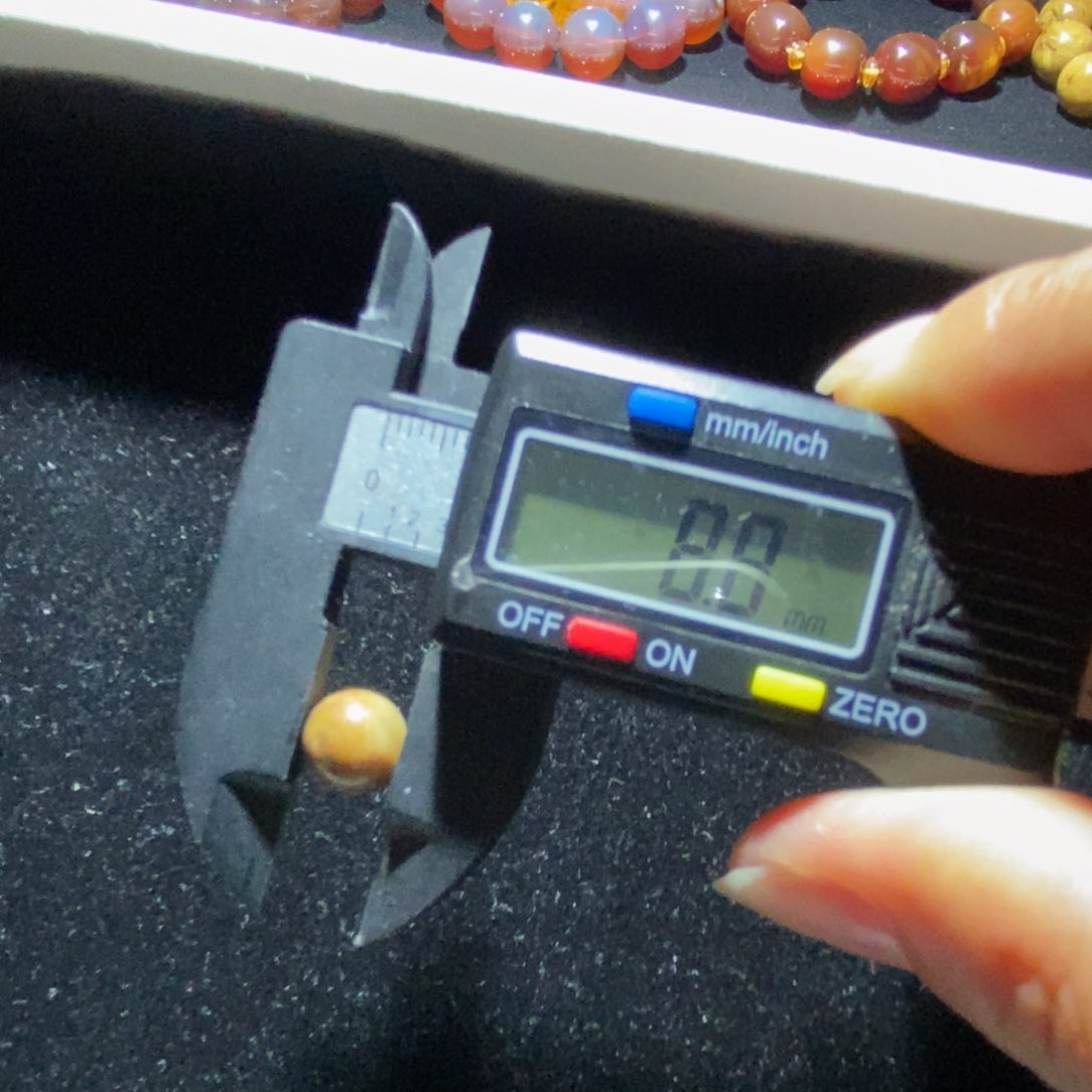 猪***2未镶嵌琥珀裸石8 +根珀单珠打1.0孔