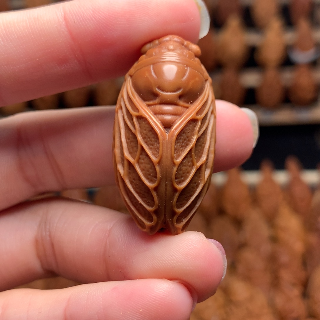 把件橄榄核一鸣惊人