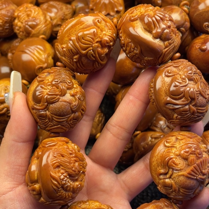 橄榄核吊坠庐****漆橄榄核