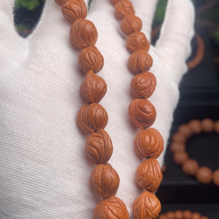 不***的桃核吊坠精品手持