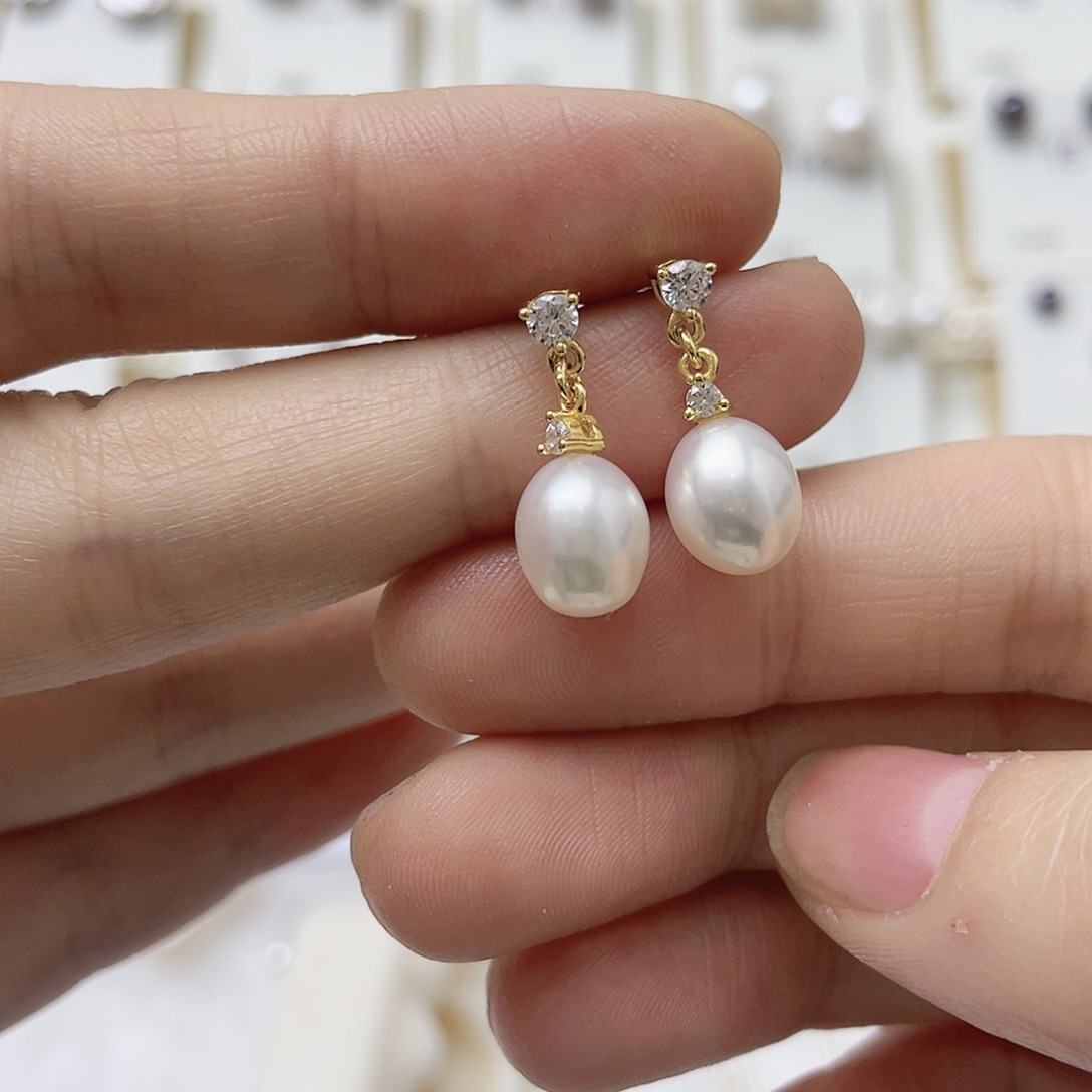 阿***呀淡水珍珠耳饰银S925镶嵌