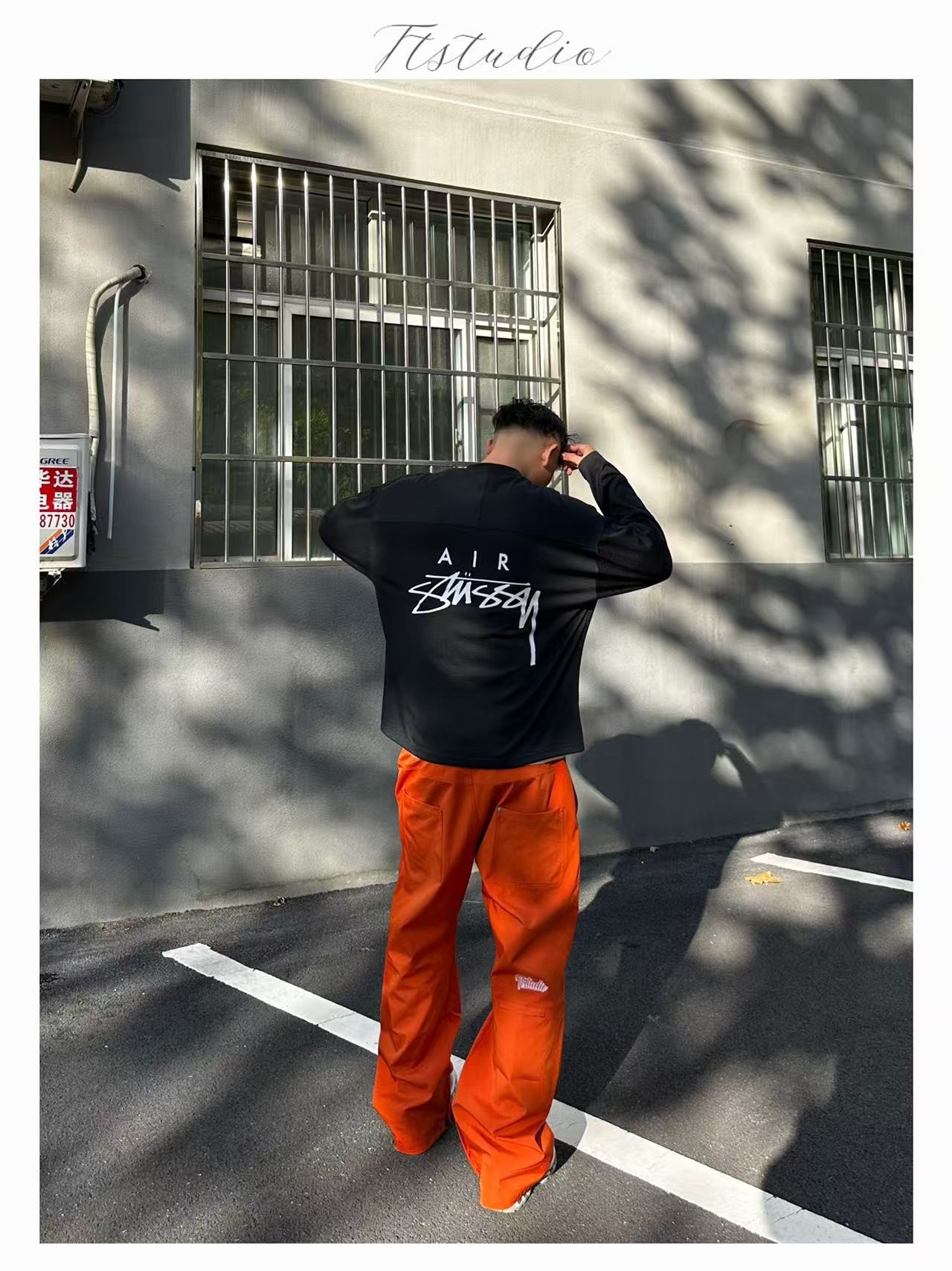 Ttstudio户外暗橘色冲锋裤秋新款三防弯刀可调节版型工装冲锋裤