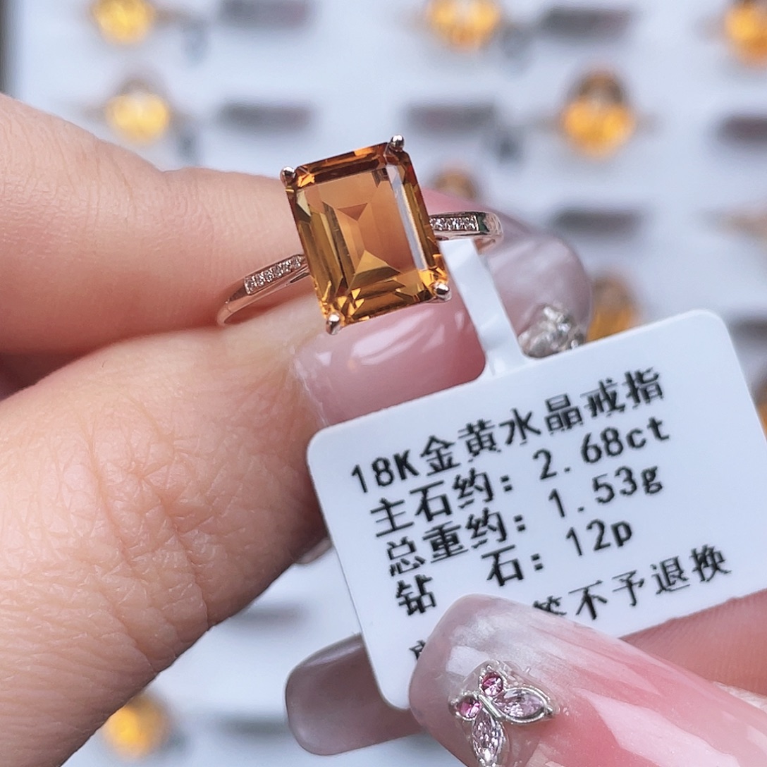 燕***黄晶戒指18K金镶嵌