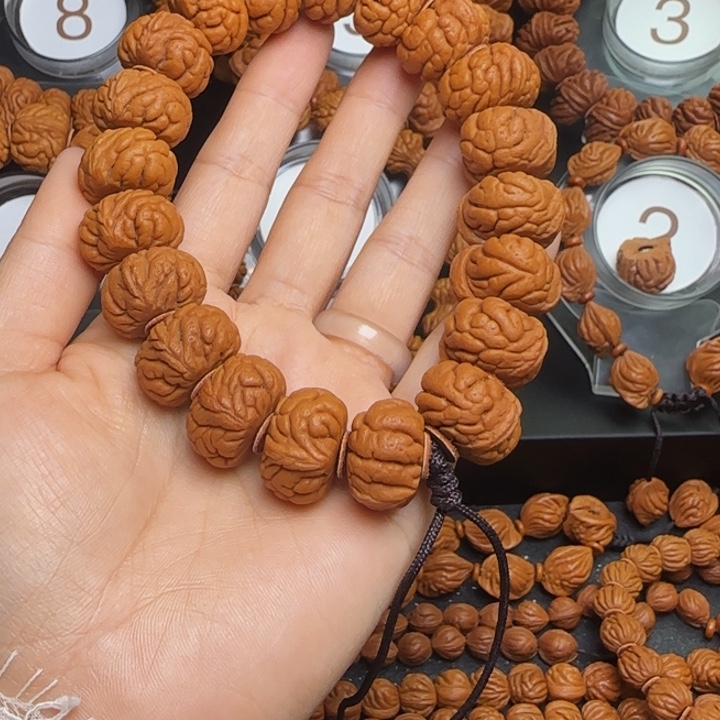 兴***3桃核手串龙纹桃核