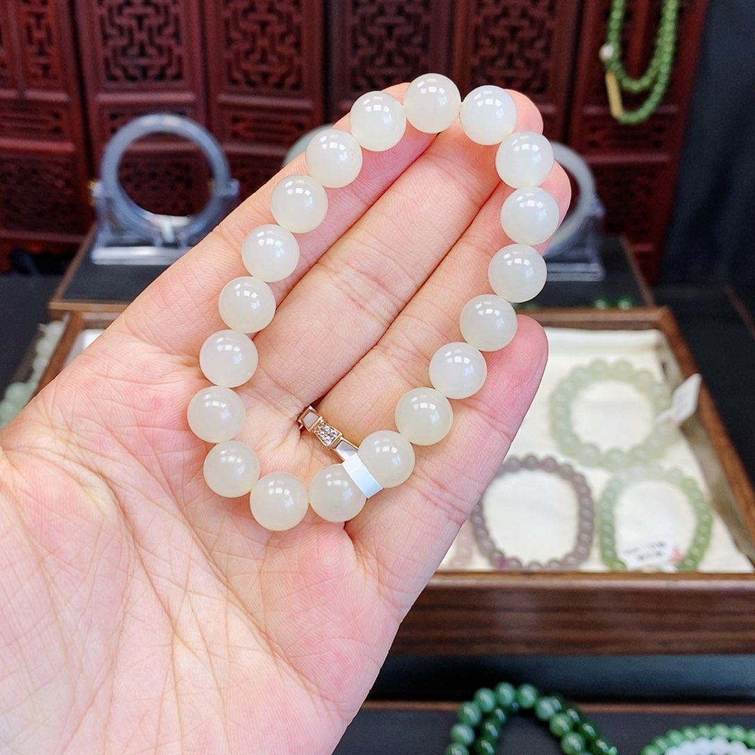 和田玉手串未镶嵌一****?蜂蜜水10