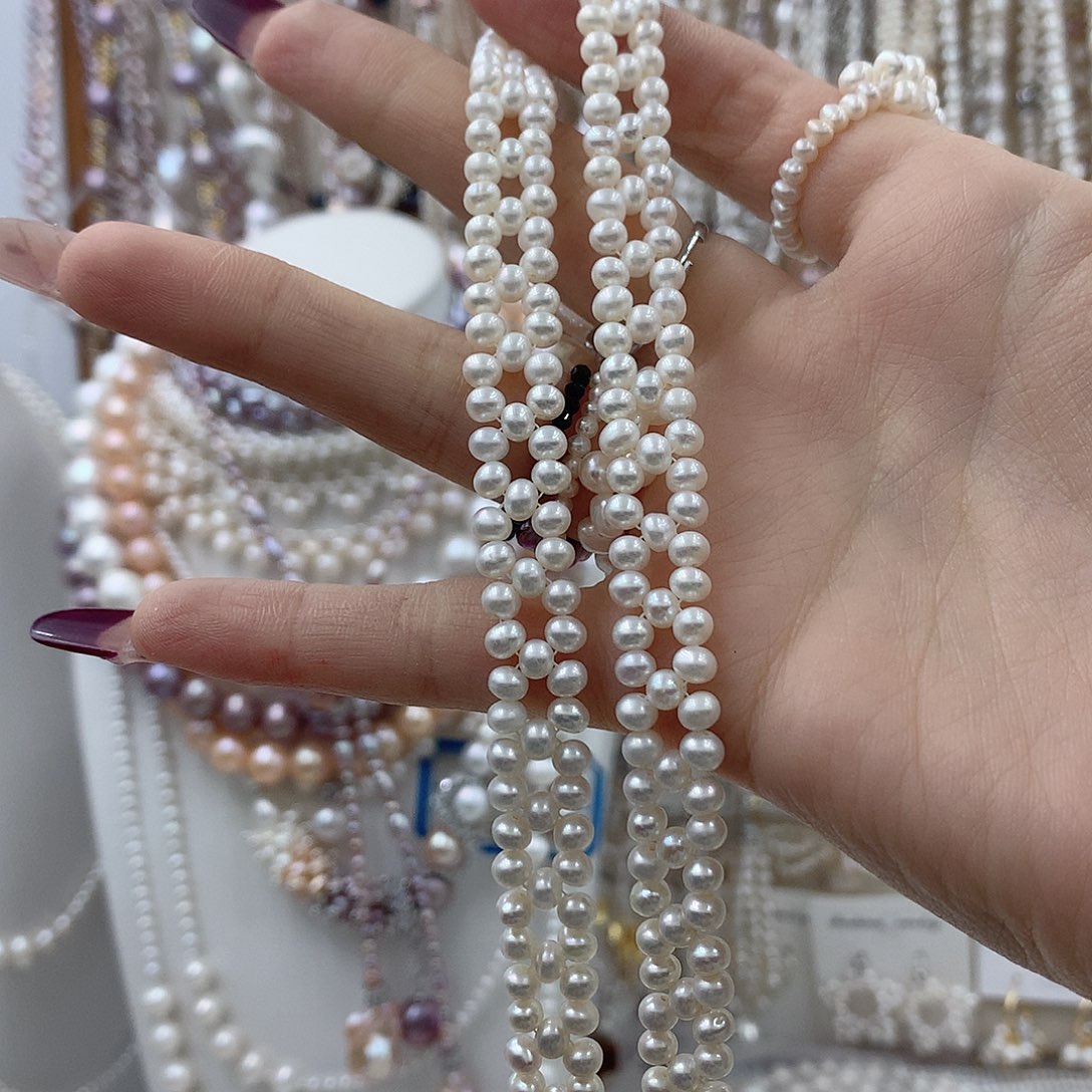 闫***饭银S925镶嵌淡水珍珠耳饰