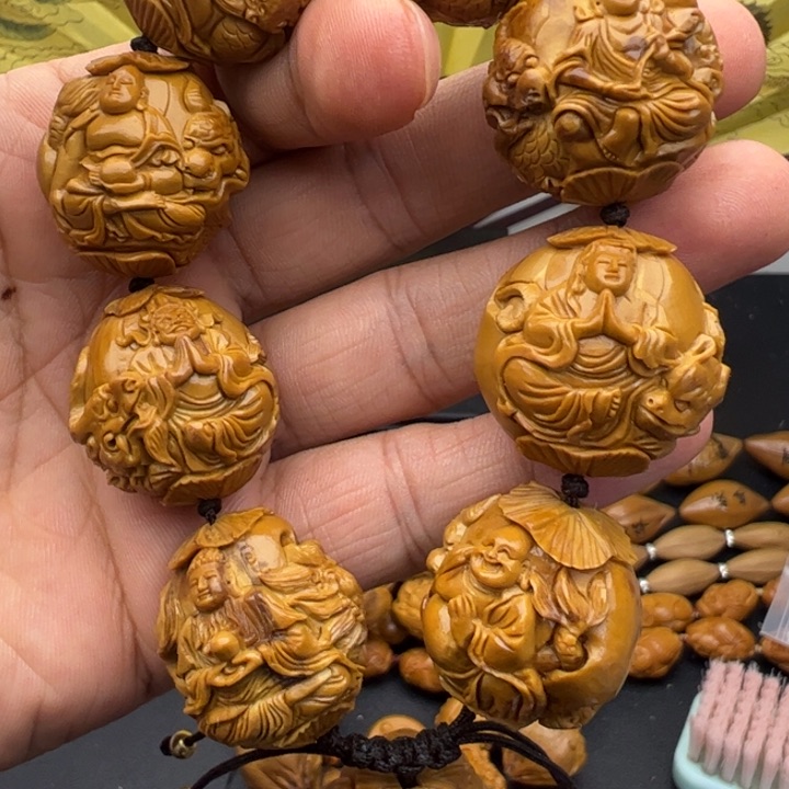 橄榄核手串/手链2.7四花纯手工瑞兽万佛返油