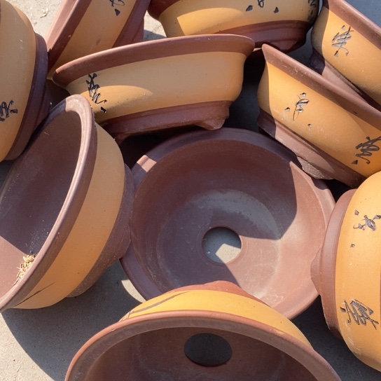 紫砂花盆100-10。   22.5-9