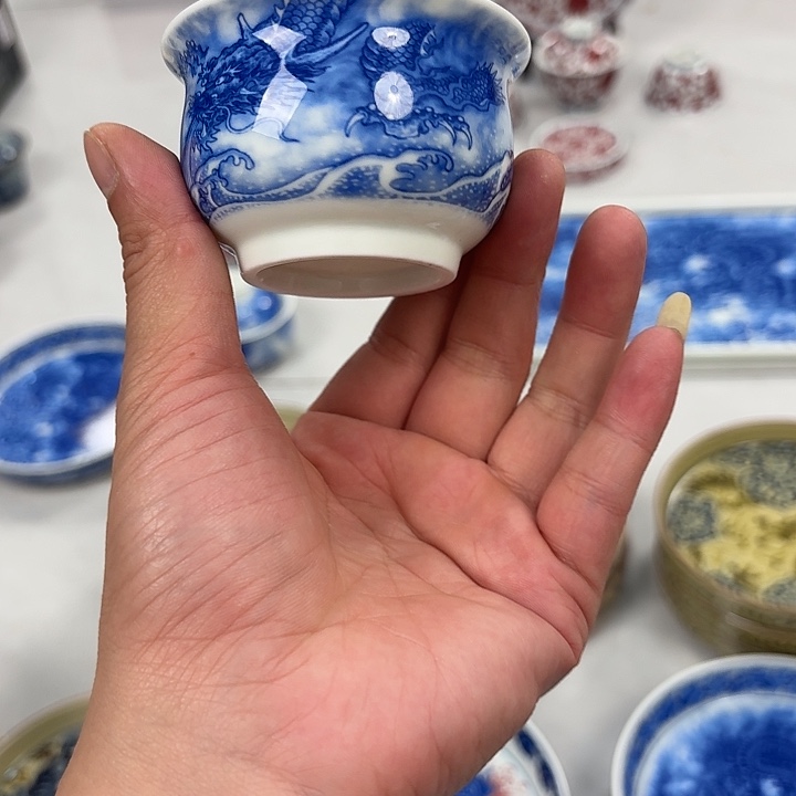 瓷片墨龙吸水布袋主人杯