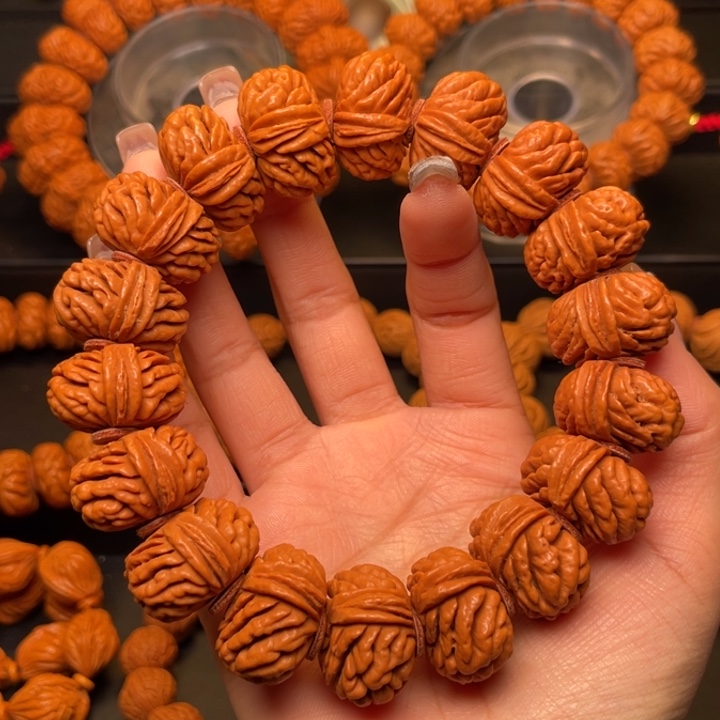 桃核手串23尺寸飞碟刺龙手串（21号链接）