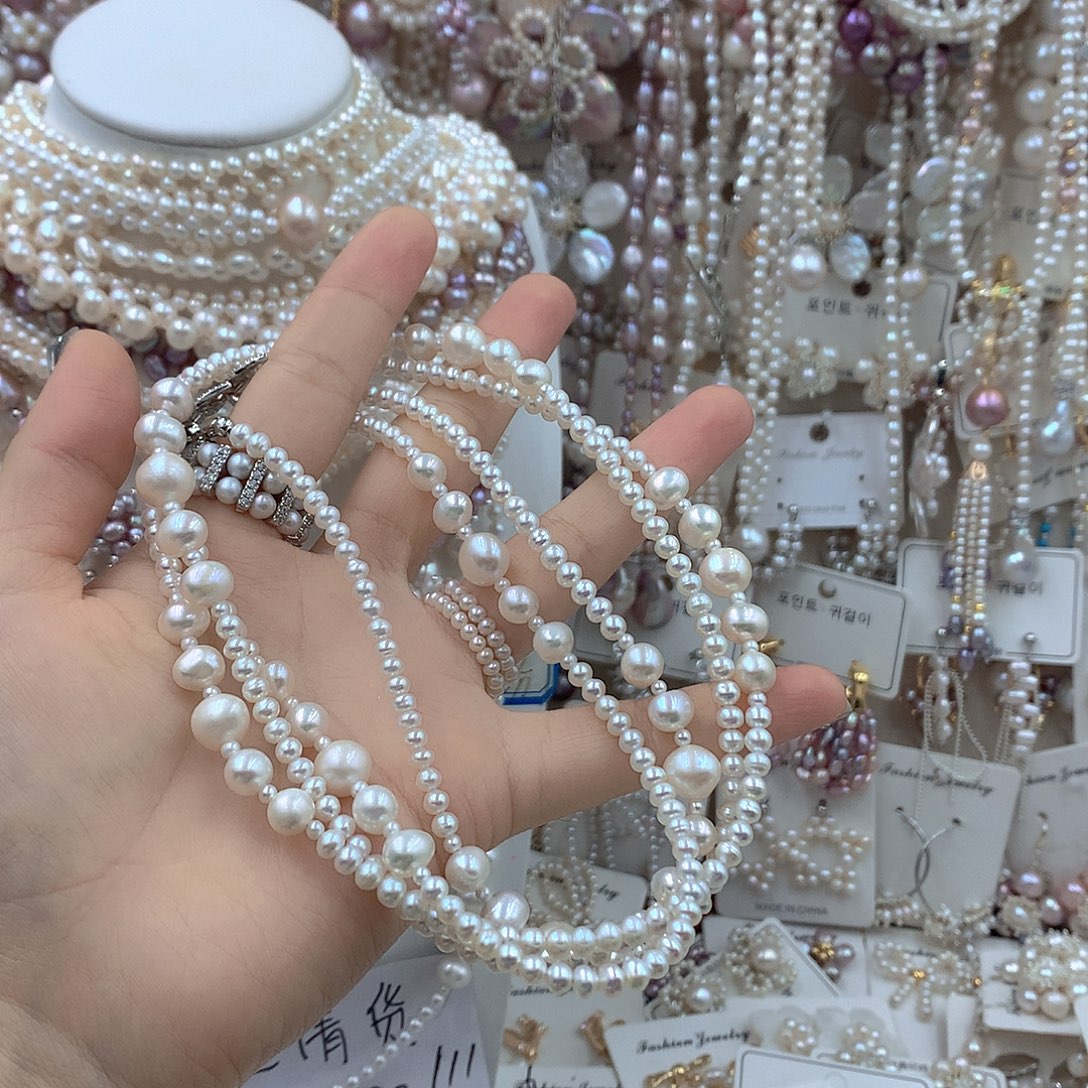 s***米淡水珍珠银S925镶嵌耳饰