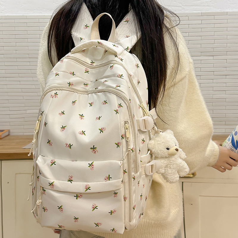 现货双肩背包女款大容量初中生书包碎花甜美书包小学生新款