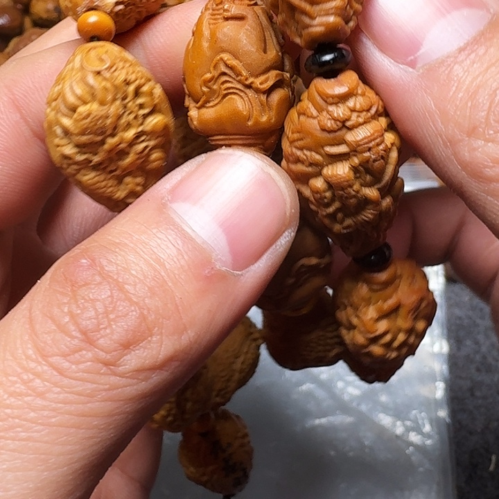 橄榄核吊坠你的手机