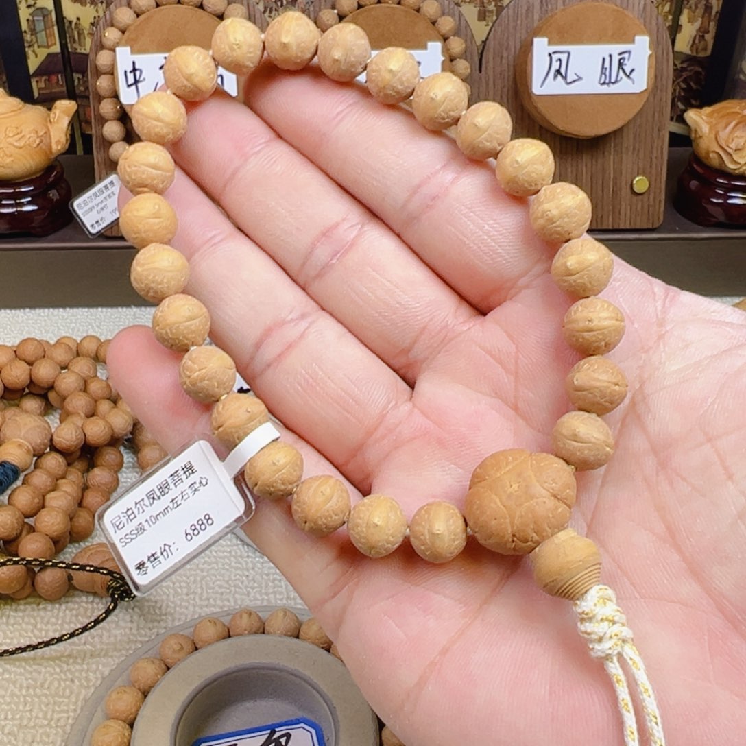 雨***同手串凤眼菩提10mm左右实心