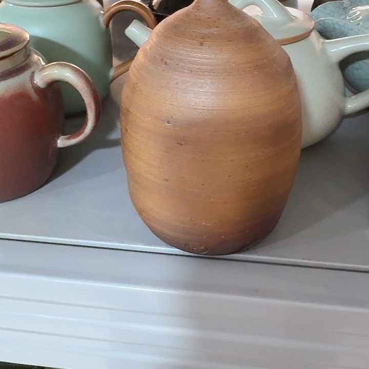 主人杯一个，瓷。。品茗