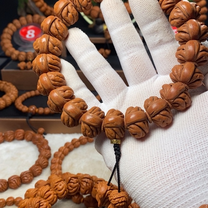 桃核吊坠哈*咯秦岭龙纹桃核