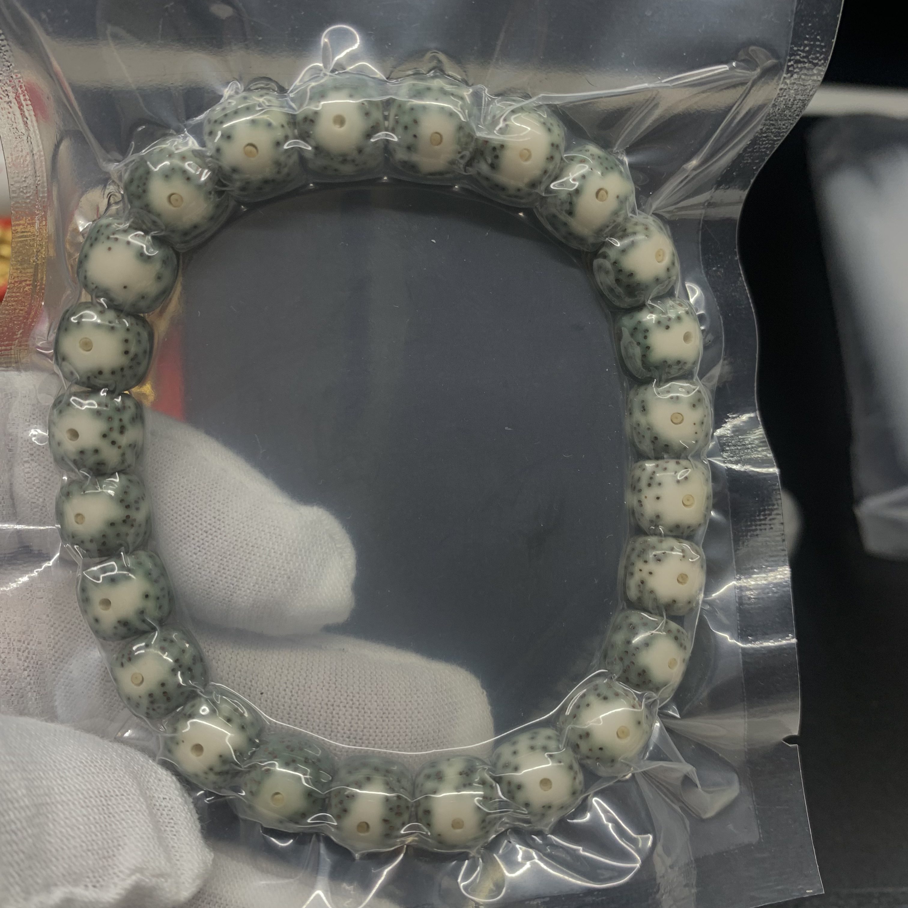 珍品海南星月菩提石玉料绿包白大眼睛9*10桶珠单圈手串