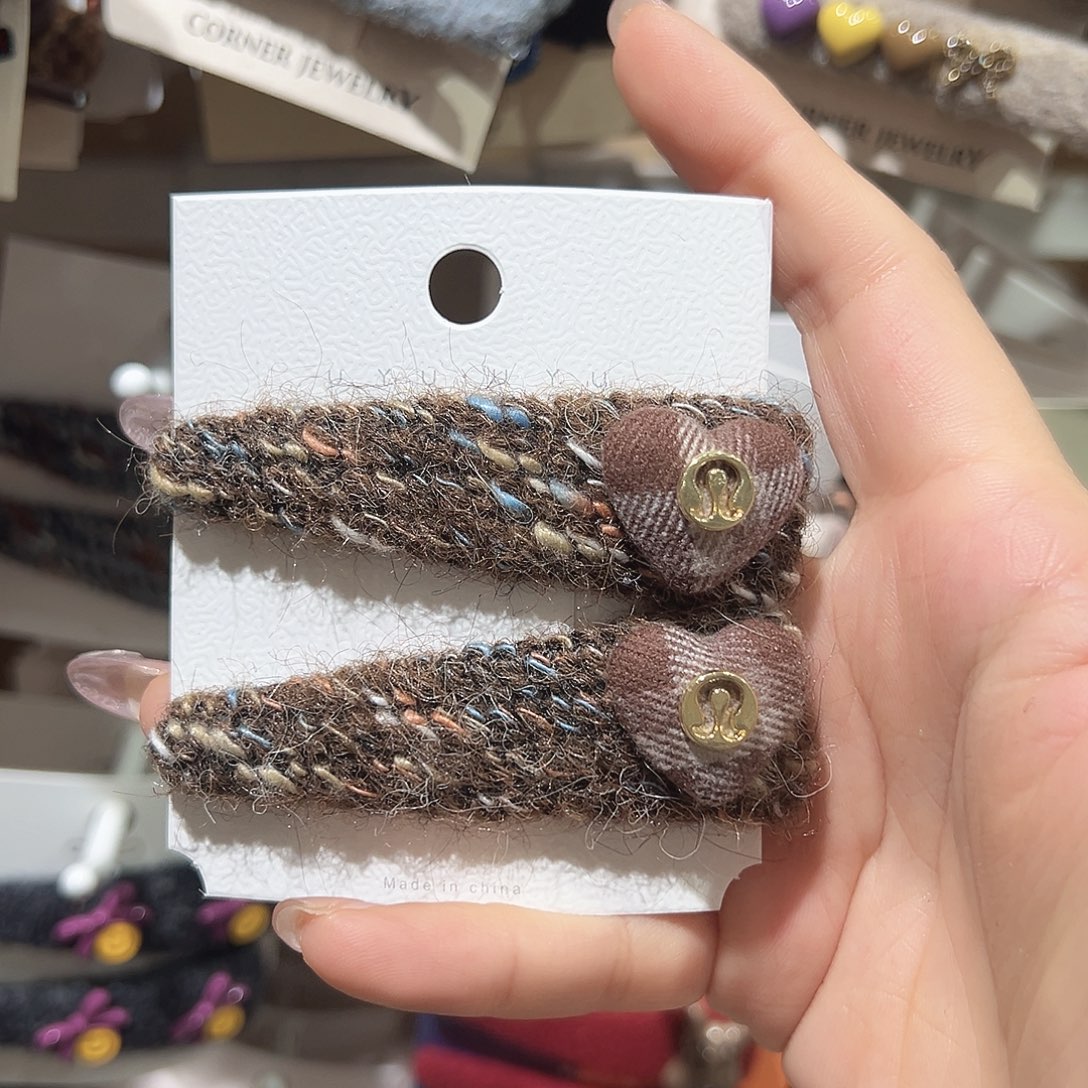 羽毛铁合金咖色露爱心掰掰夹