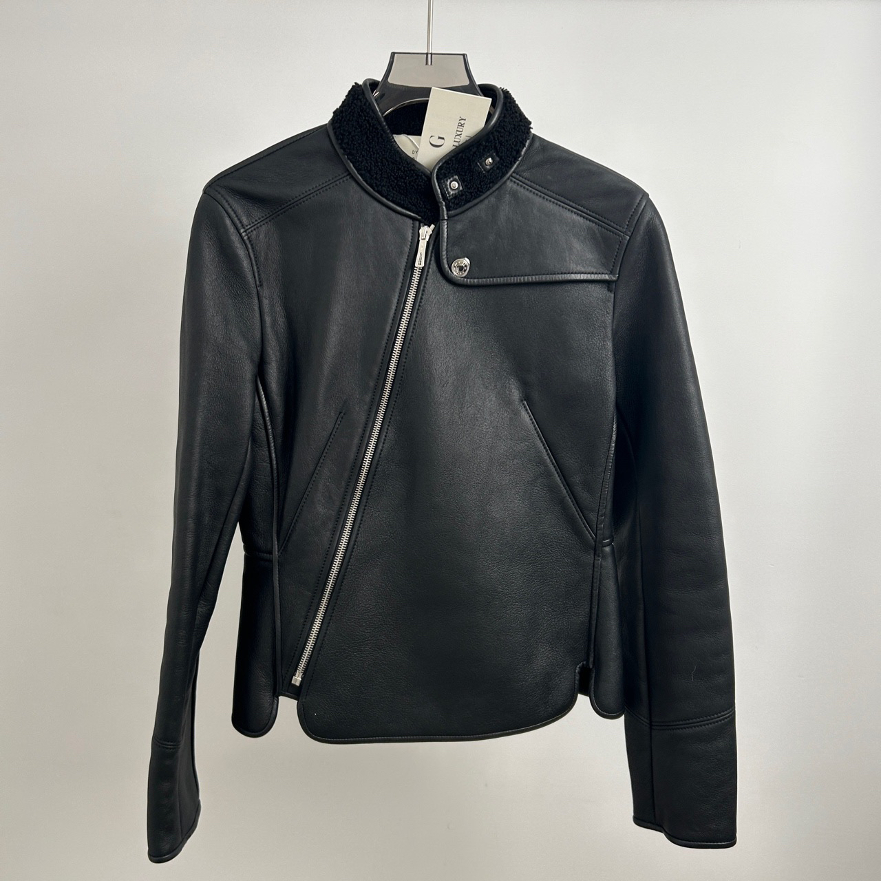 99新 Hermes/爱马仕 纯黑皮毛一体外套 36码 99新 GM002369