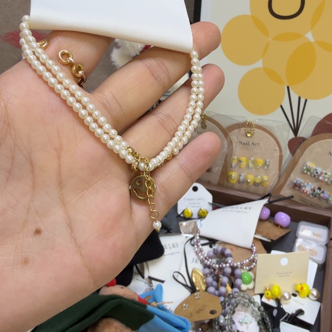 小米珠款项链笑脸