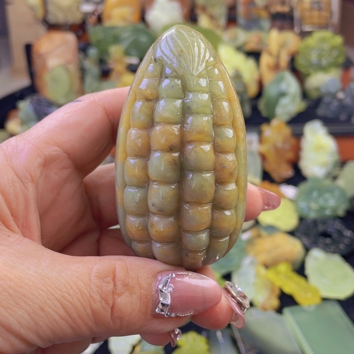 蛇纹石玉手把件合金