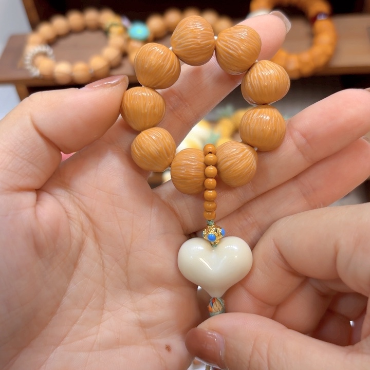 星月菩提手串猴头拉丝爱心皮桃手捻