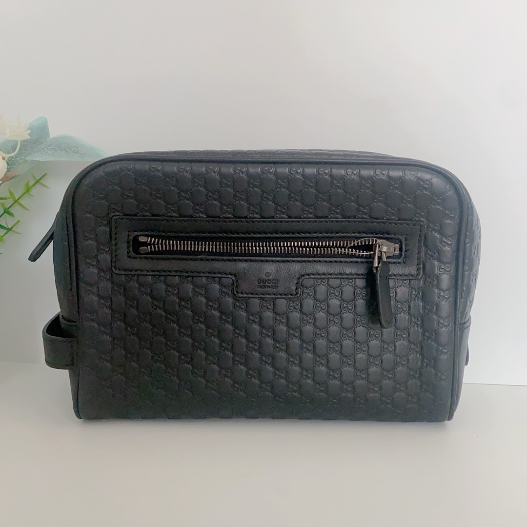 95新 GUCCI/古驰 黑色老花手拿包16311635二奢