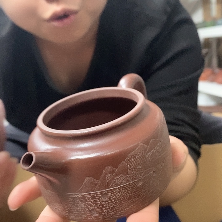 紫砂茶壶仍然让他柔软