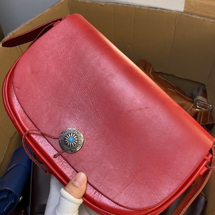 头层牛皮瑕疵单肩包