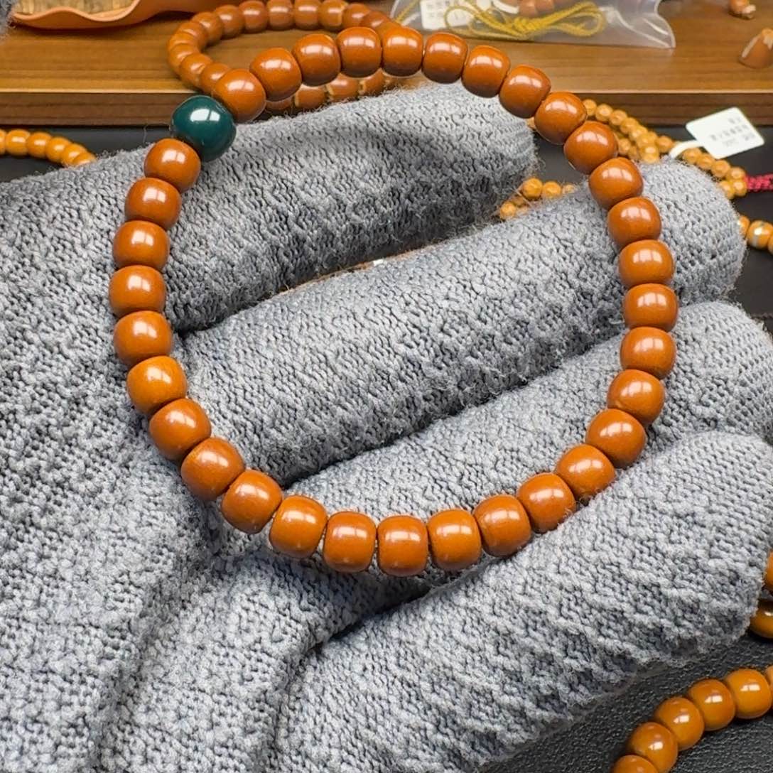 随***风橄榄核手串/手链6.7老挝核尖单圈微白