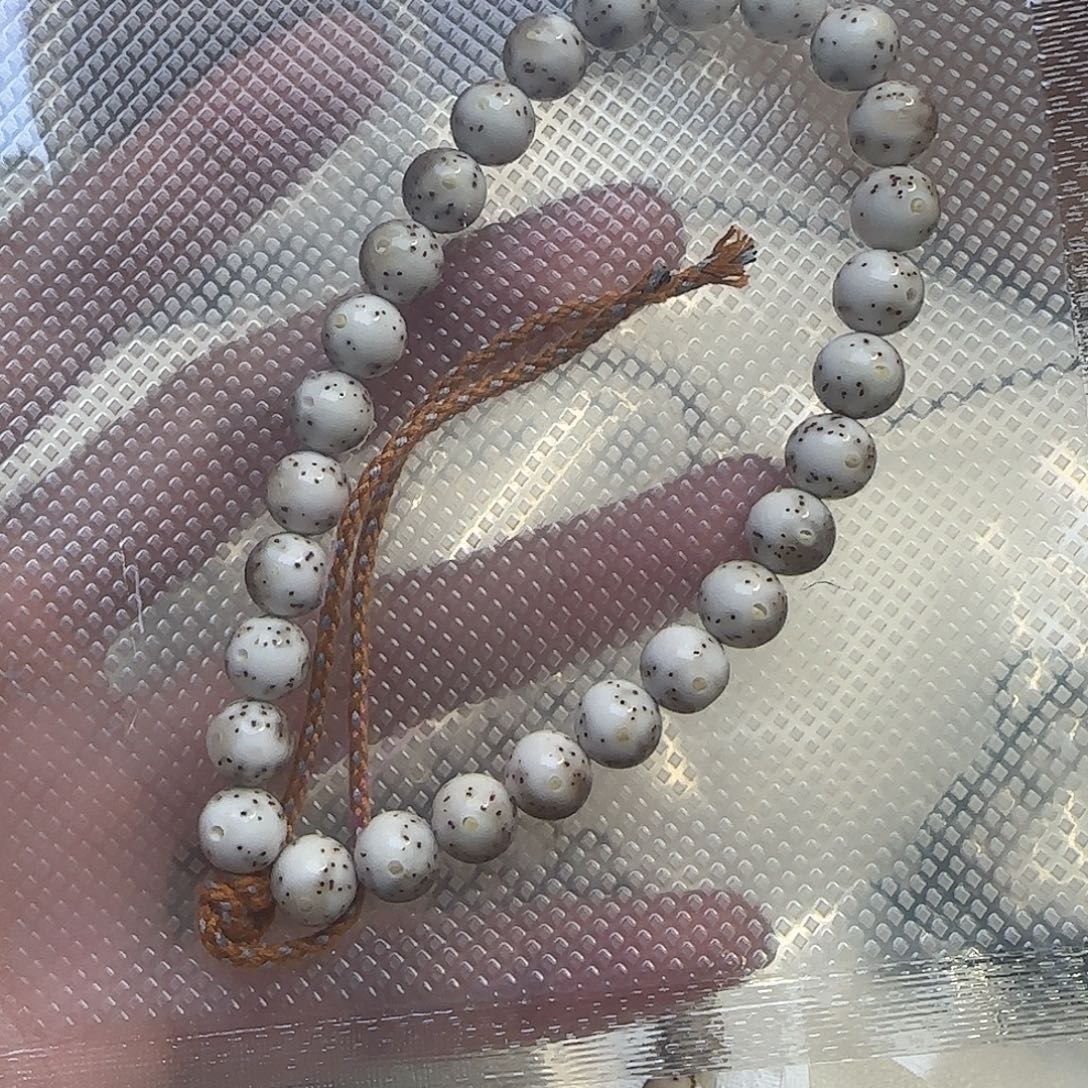 孙***禾星月菩提吊坠石玉火烧云卡8大留白圆珠龙蛋