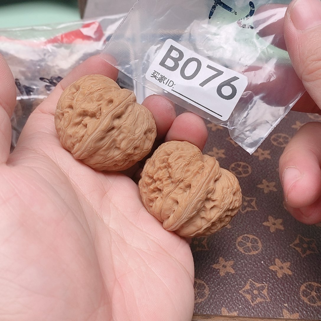 把件文玩核桃元宝42尺。   