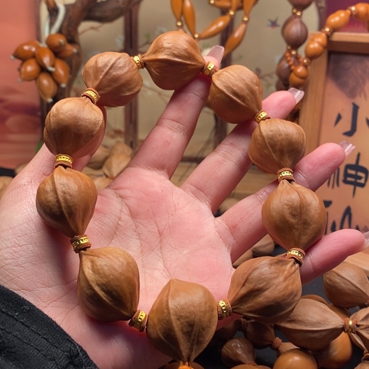 鐸***橄榄核手串/手链2.5四花铁盒