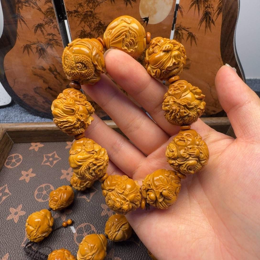 雪***意橄榄核手串/手链2.4龙财