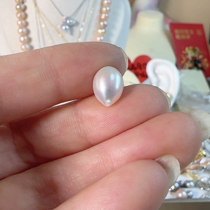 淡水珍珠圆巴有生长纹裸珠未镶嵌火****?