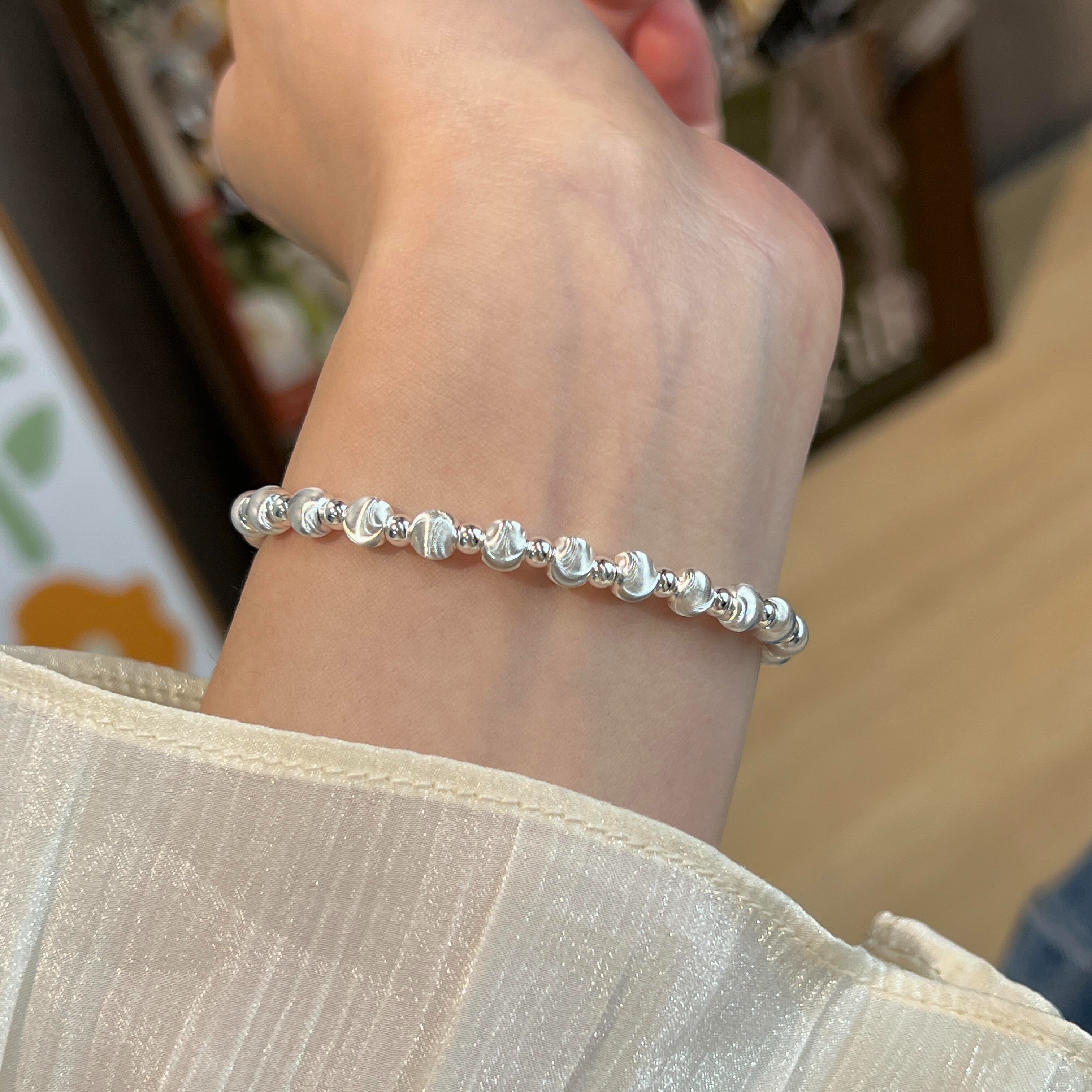 通体 999足银同款  28458拉丝猫眼珠手链6mm