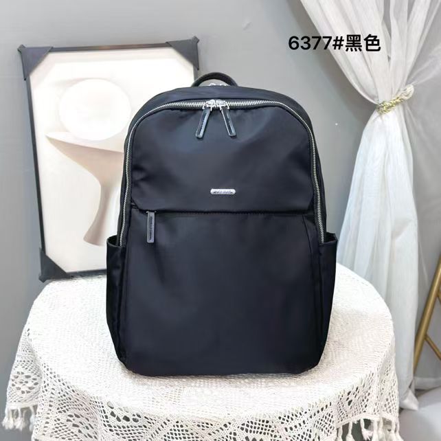 竖款耐磨女士纯色双肩包轻便时尚百搭黑色时尚高品质潮流双肩背