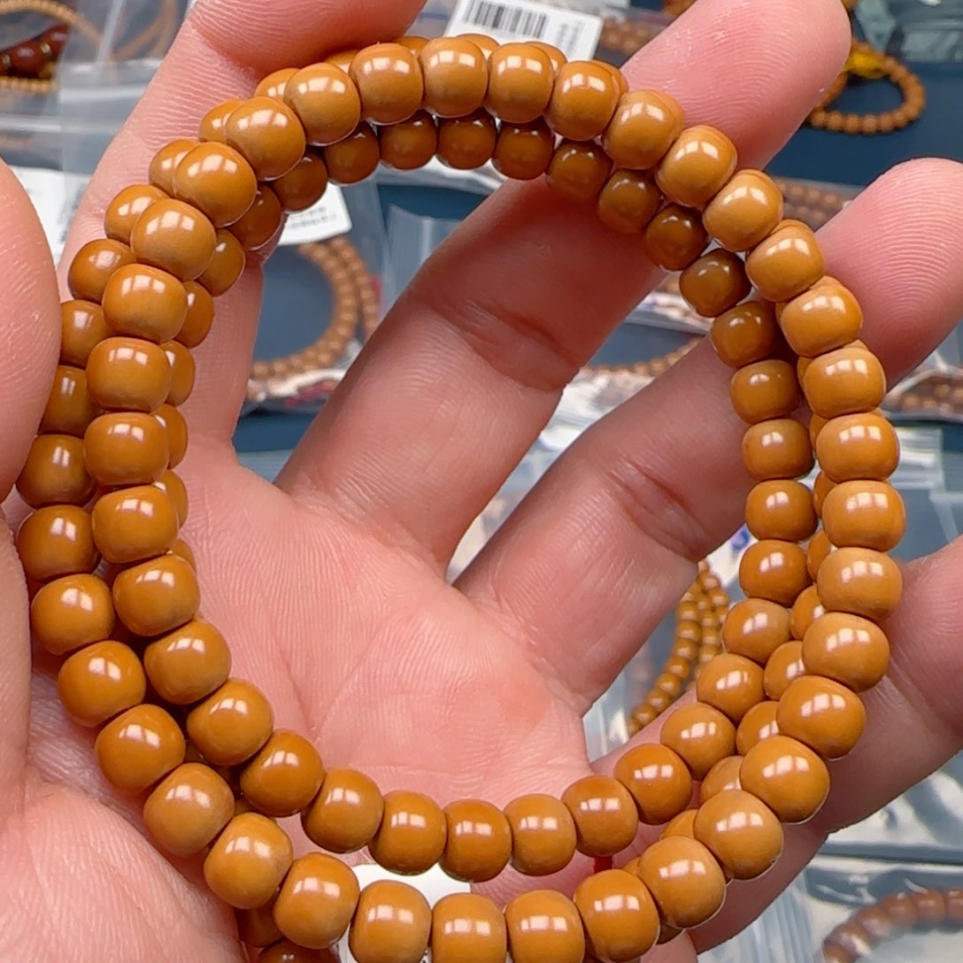 亚***根橄榄核手串老挝SS级核尖极限弧尺寸6.9