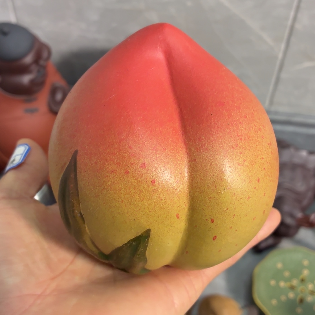 紫砂茶杯放漏放漏放大漏了