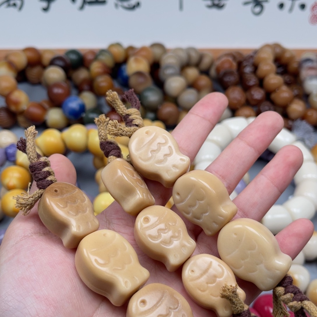 吊坠菩提根/象牙果T28鱼饼22-25瑕疵一串随机