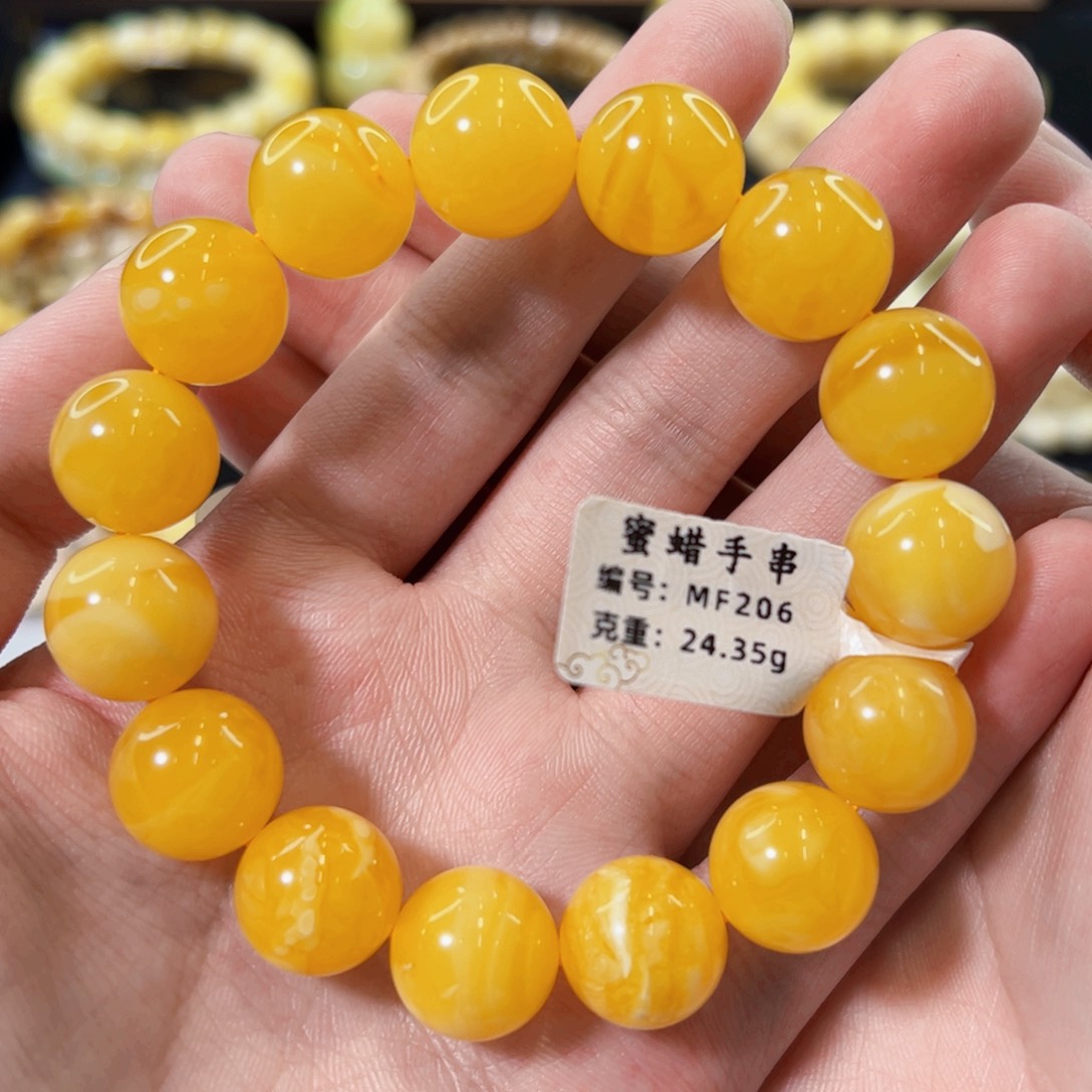 裸石琥珀未镶嵌14mm焦皮橘红满蜡圆珠手串