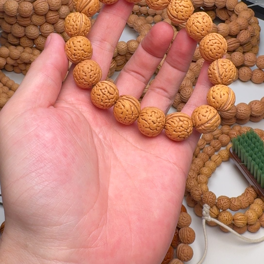 桃核手串二*16mm+肌肉纹手串