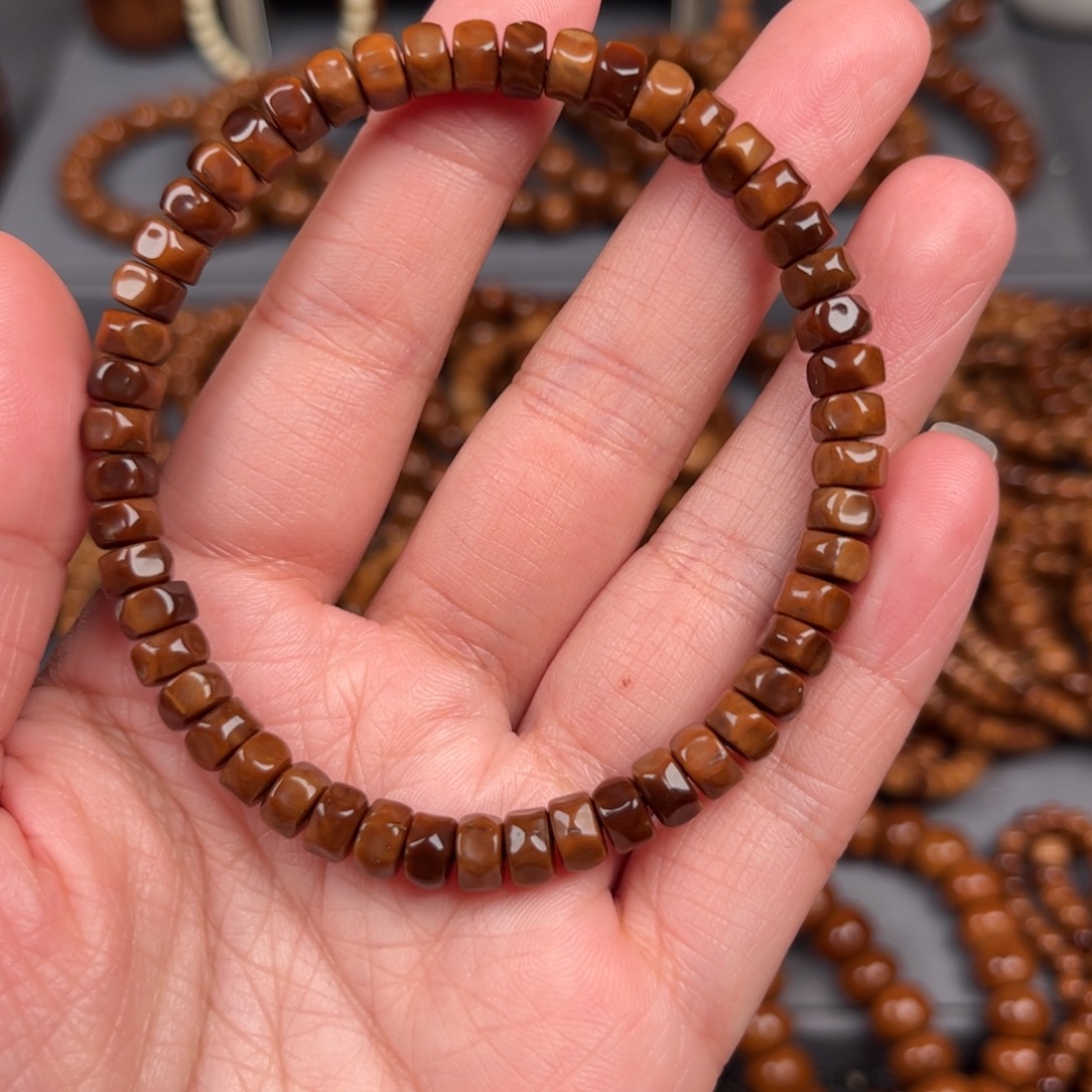 呦***鸣果皮4*7药片无相单圈手串