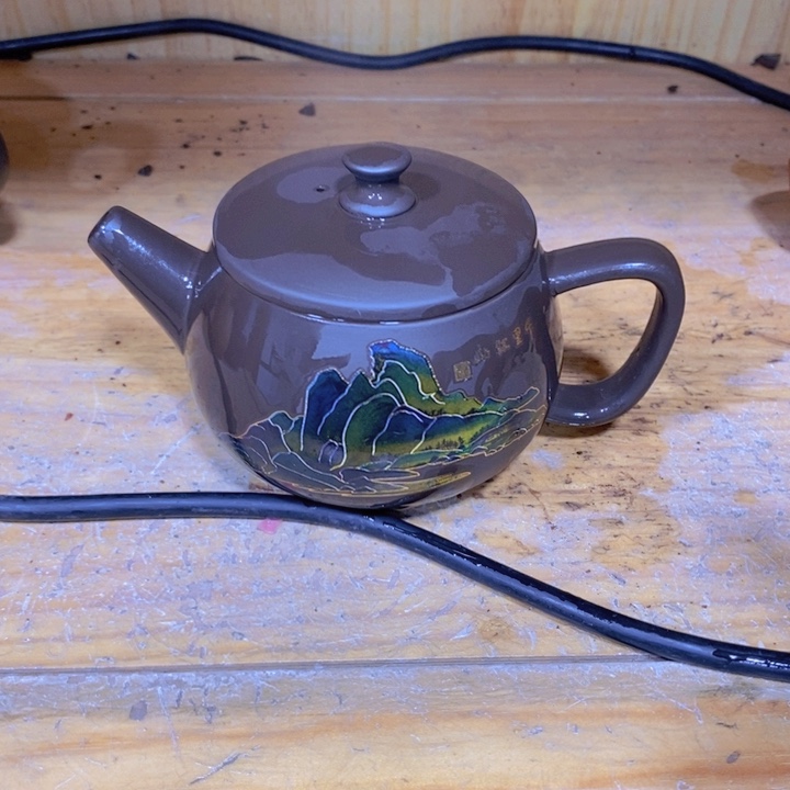紫砂茶壶我也不知道