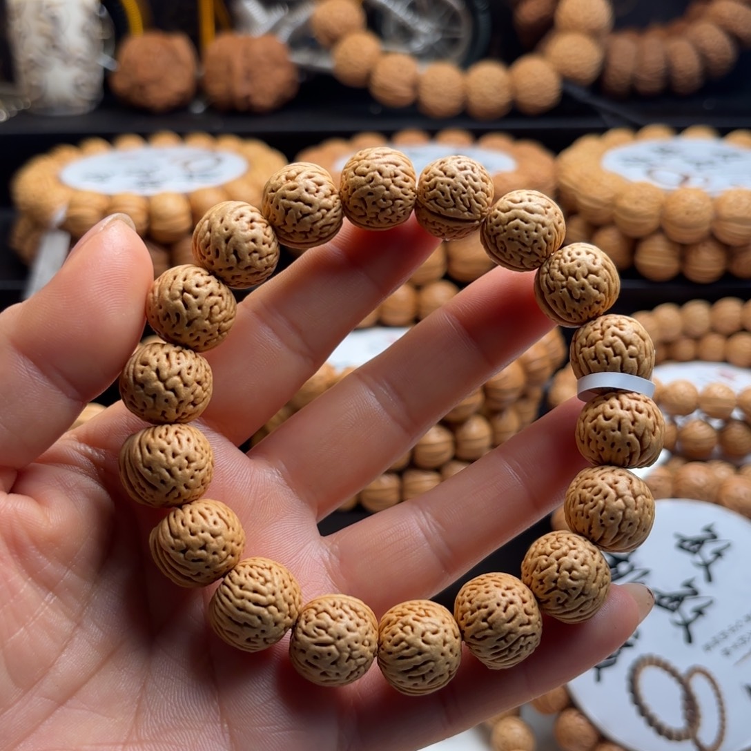 〃***、菩提籽类钢炮桃核手串