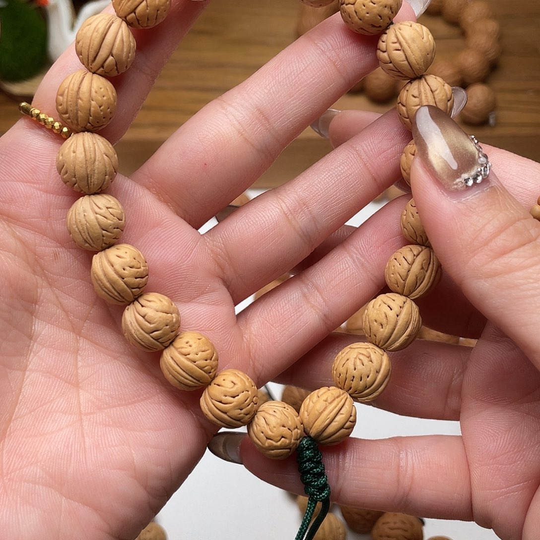 筱***苏11加野生奶油小肠纹桃核