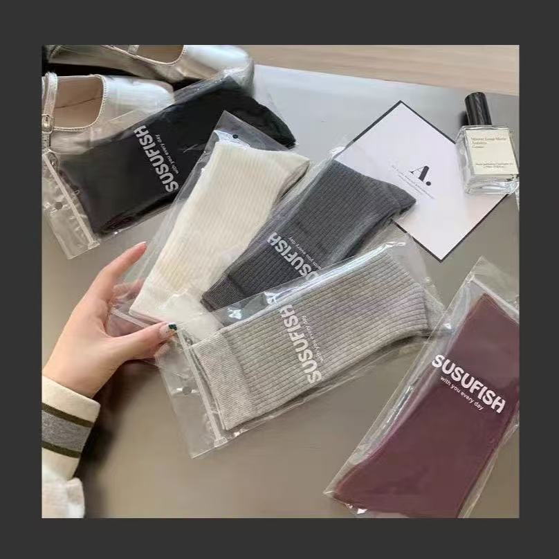 随机运动中筒袜一双